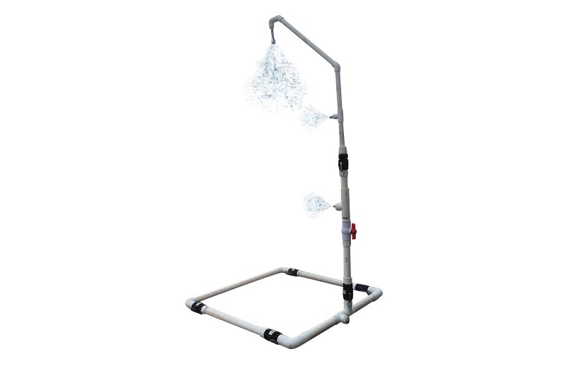 Husky Econo decon shower frame spraying from two side heads and a top head